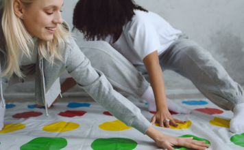 two women playing Twister